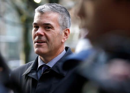 FILE PHOTO: Huawei Canada Vice President of Corporate Affairs Scott Bradley stands outside after the B.C. Supreme Court bail hearing of Huawei CFO Meng Wanzhou, who was released on a $10 million bail in Vancouver, British Columbia, Canada December 11, 2018. REUTERS/Lindsey Wasson/File Photo