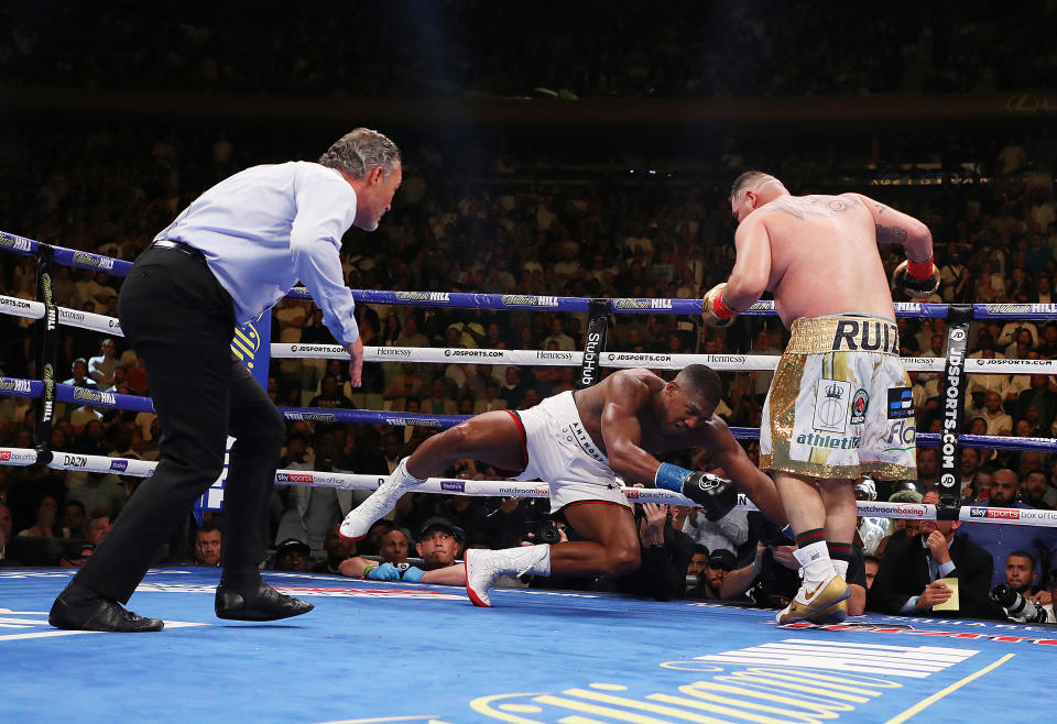 NEW YORK, NEW YORK - JUNE 01:  Andy Ruiz Jr knocks down Anthony Joshua in the seventh round during their IBF/WBA/WBO heavyweight title fight at Madison Square Garden on June 01, 2019 in New York City. (Photo by Al Bello/Getty Images)