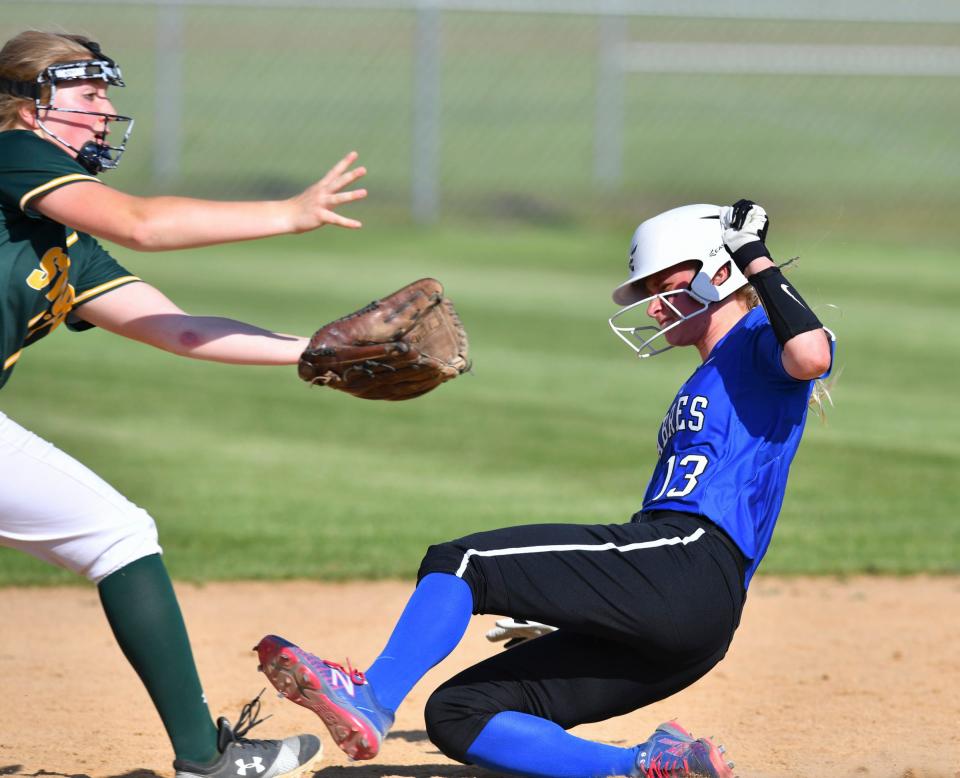 Corina Miller of Sauk Rapids waits for the throw at second as  Jaiden Tretter slides in safely during the game Thursday, June 3, 2021, at Sartell High School.