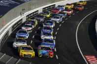 Joey Logano, bottom left, and Kyle Busch, bottom right, lead the field during a NASCAR exhibition auto race at Los Angeles Memorial Coliseum, Sunday, Feb. 6, 2022, in Los Angeles. (AP Photo/Marcio Jose Sanchez)