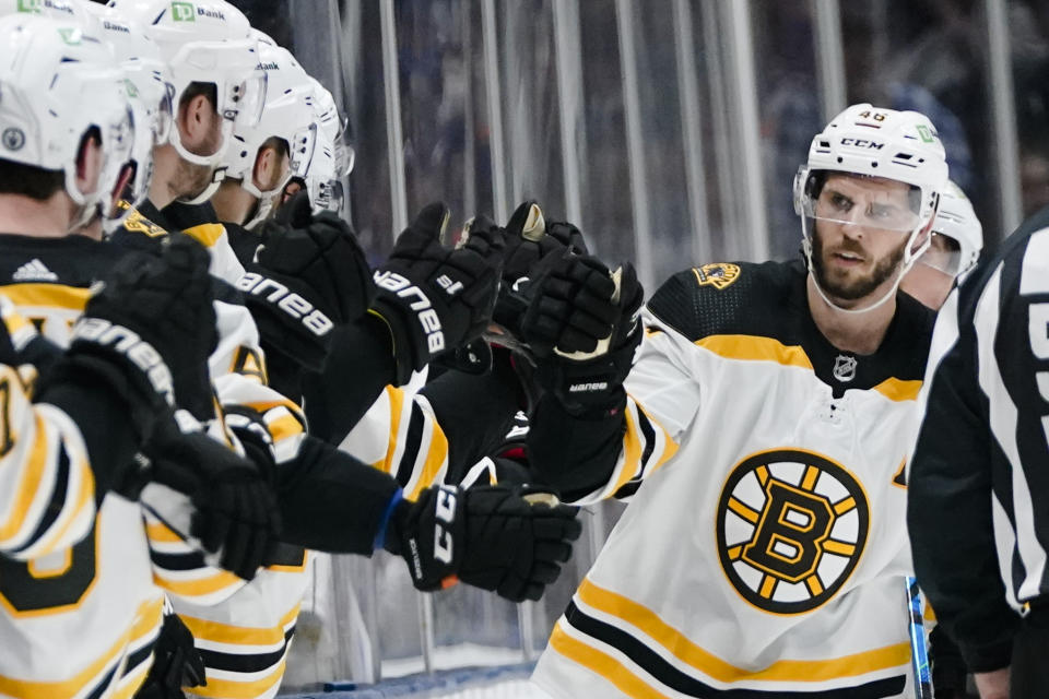 Boston Bruins' David Krejci (46) celebrates with teammates after scoring a goal during the second period of Game 4 during an NHL hockey second-round playoff series against the New York Islanders, Saturday, June 5, 2021, in Uniondale, N.Y. (AP Photo/Frank Franklin II)
