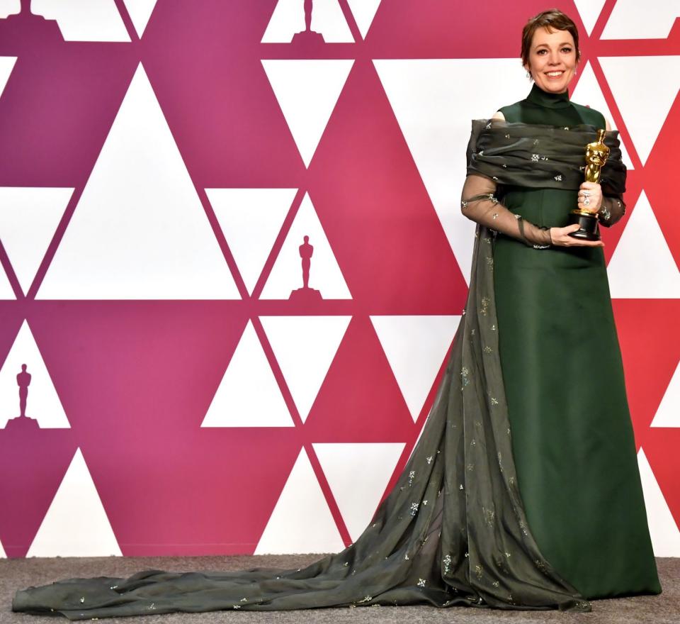 Olivia Colman in a custom-made Prada emerald green silk gown at the 2019 Oscars