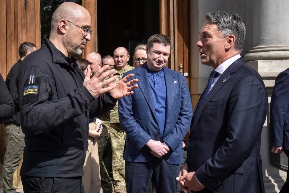 Ukrainian prime minister Denys Shmyhal, left, meets Australian defence minister Richard Marles (Reuters)