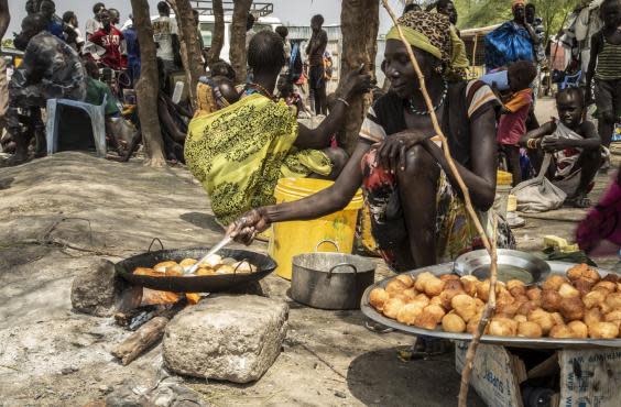 Women walk for hours and risk assault to earn a living at Pibor market, South Sudan (Bel Trew)