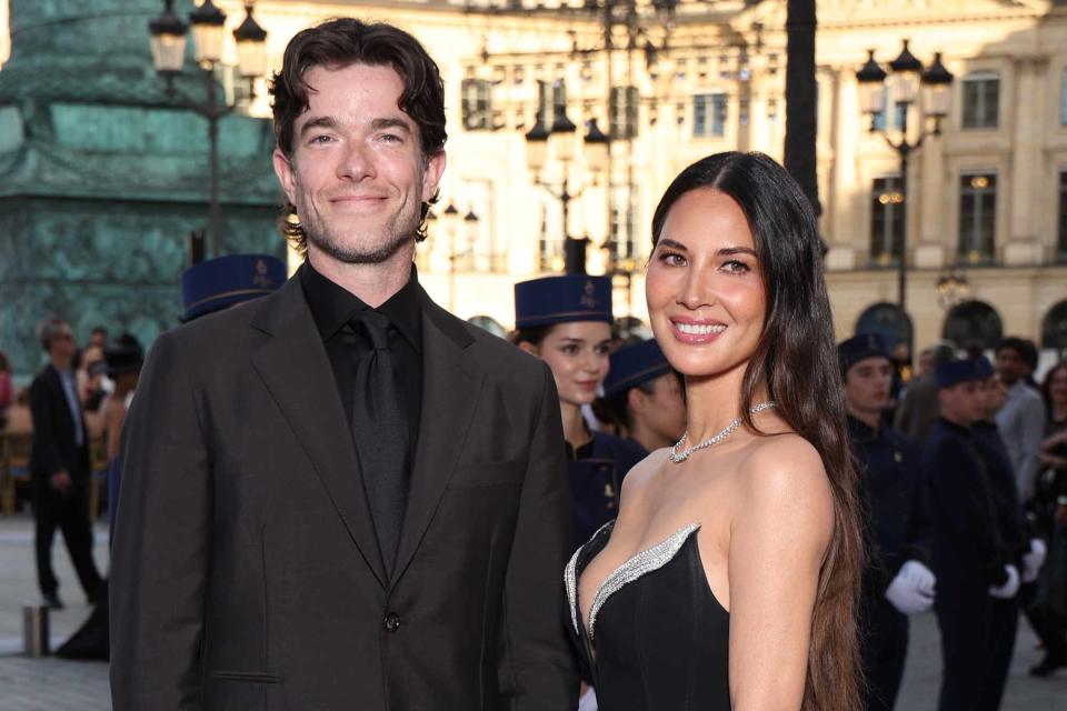 <p>Pascal Le Segretain/Getty</p> John Mulaney and Olivia Munn at Vogue World in Paris on June 23.