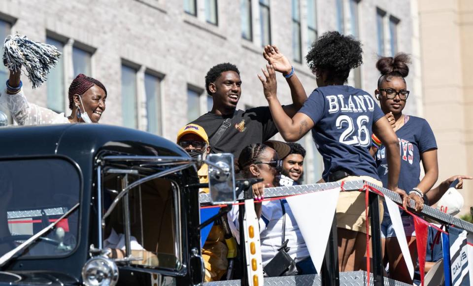 Dallas Cowboys player and Central High School graduate Daron Bland waves to the crowd during the Independence Day Parade in Modesto, Calif., Tuesday, July 4, 2023. Andy Alfaro/aalfaro@modbee.com