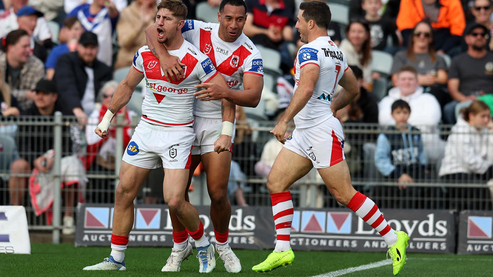 Zac Lomax celebrates a try for the Dragons.