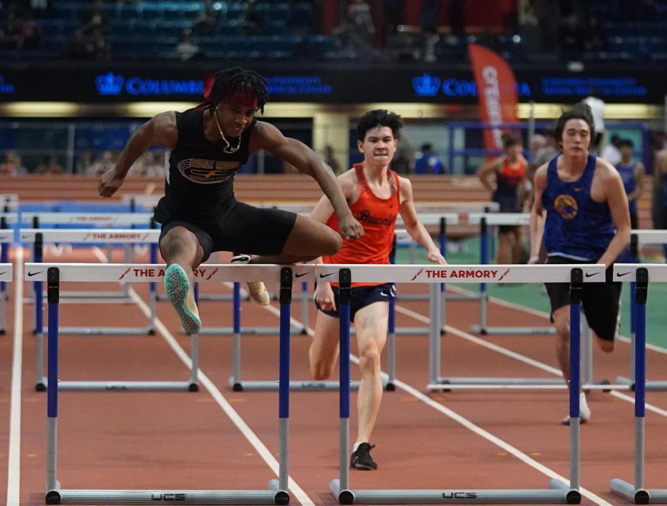 Mount Vernon's Eloha-Karmiel Yitzchak runs in the 55-meter hurdles in the Westchester Co. Track & Field Championships at The Armory. Track & Field Center in New York on Saturday, January 28, 2023.