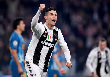 FILE PHOTO: Soccer Football - Champions League - Round of 16 Second Leg - Juventus v Atletico Madrid - Allianz Stadium, Turin, Italy - March 12, 2019 Juventus' Cristiano Ronaldo celebrates scoring their second goal REUTERS/Alberto Lingria/File Photo