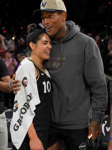 <p>David Becker/NBAE/Getty</p> Darren Waller and Kelsey Plum after Round 1 Game 1 of the 2022 WNBA Playoffs.