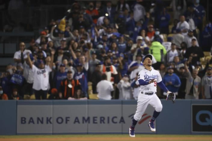 Los Angeles, CA - October 12: Los Angeles Dodgers right fielder Mookie Betts calls for a pop fly by San Francisco Giants&#39; Donovan Solano to end game four of the 2021 National League Division Series at Dodger Stadium on Tuesday, Oct. 12, 2021 in Los Angeles, CA. (Robert Gauthier / Los Angeles Times)