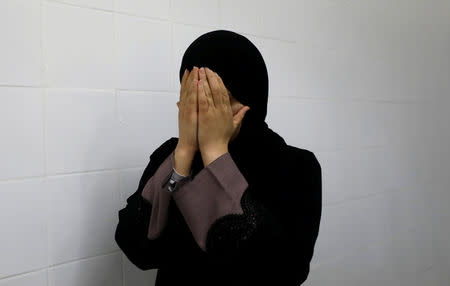 A relative of a Palestinian, who was killed by Israeli troops, reacts at a hospital in Ramallah, in the occupied West Bank June 6, 2018. REUTERS/Mohamad Torokman