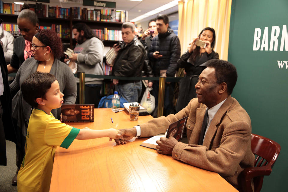 Pelé signs copies of his book Why Soccer Matters at Barnes & Noble in New York City on April 1, 2014.