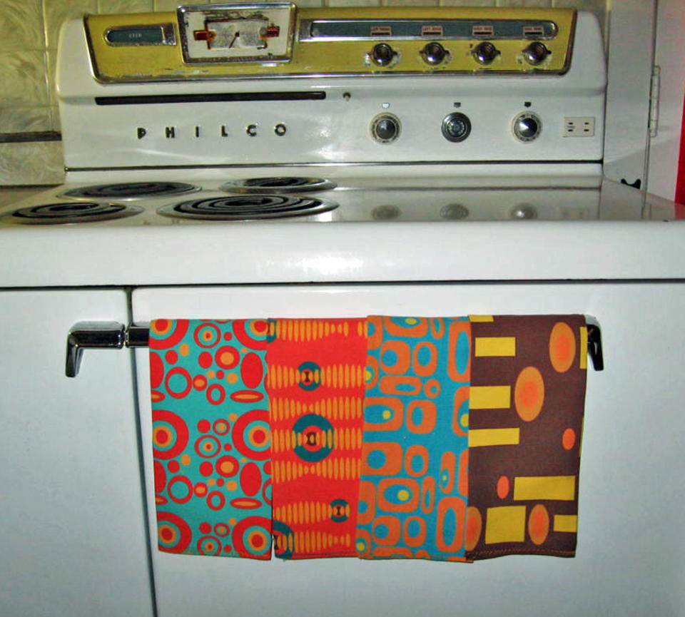 This undated photo courtesy of Renee Pedro/Crash Pad Designs shows the custom tea towels she made for her home in Philadelphia. Pedro has started a business making household goods with fabrics she designs and orders through the Internet. (AP Photo/Courtesy Renee Pedro, Crash Pad Designs)