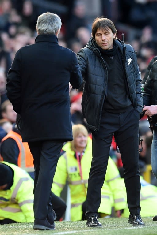 Shake on it: Mourinho shakes hands with Conte after the game