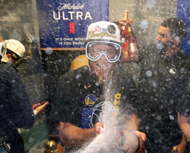 Lakers celebrate 2009 Championship in the locker room by letting loose  champagne.jpg