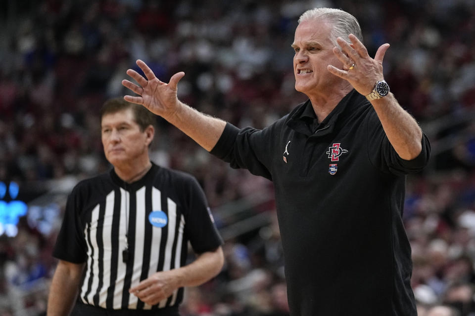 San Diego State head coach Brian Dutcher speaks in the first half of a Sweet 16 round college basketball game in the South Regional of the NCAA Tournament against Alabama, Friday, March 24, 2023, in Louisville, Ky. (AP Photo/John Bazemore)