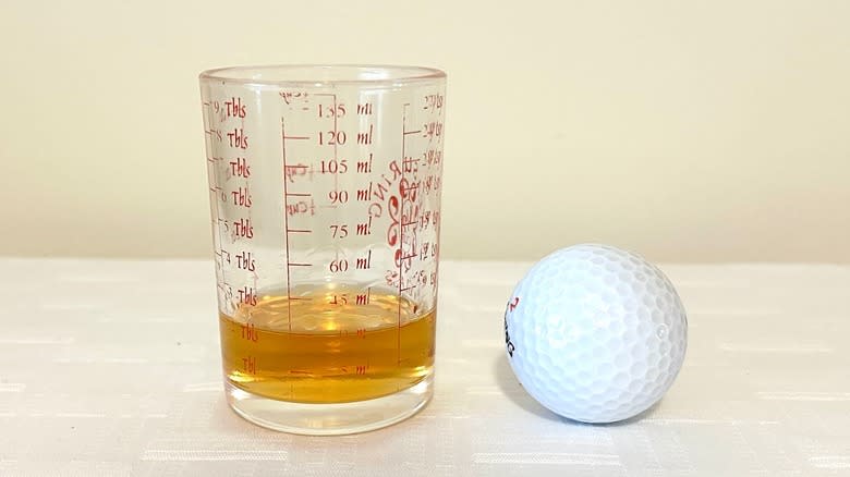 Whiskey and golf ball