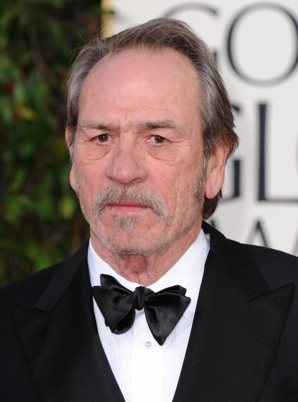 Actor Tommy Lee Jones arrives at the 70th Annual Golden Globe Awards at the Beverly Hilton Hotel on Sunday Jan. 13, 2013, in Beverly Hills, Calif. (Photo by Jordan Strauss/Invision/AP)