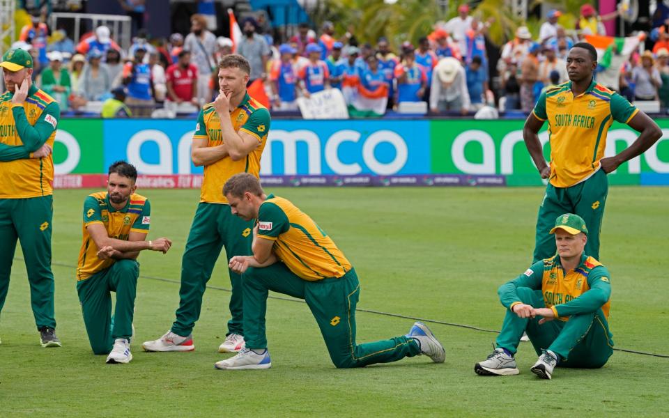 The South Africa players react after losing the final