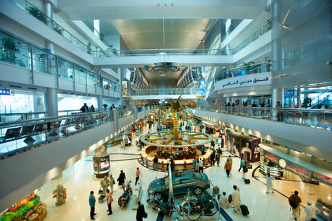 The duty-free hall at Dubai International Airport - Credit: Getty