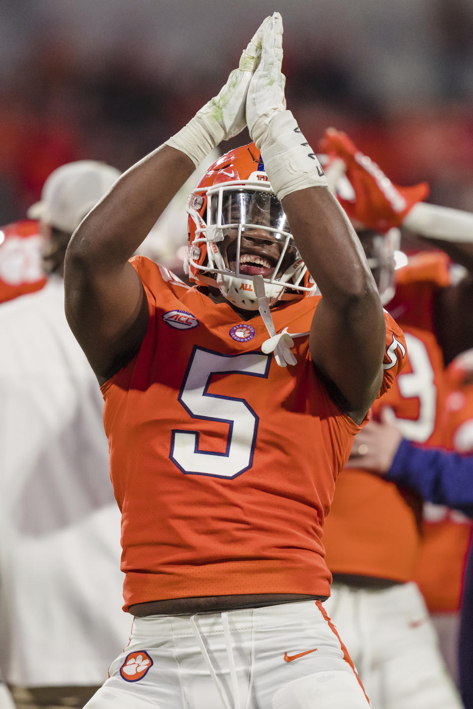 Clemson defensive end K.J. Henry gestures after a safety in the second half of the team's NCAA college football game against Miami on Saturday, Nov. 19, 2022, in Clemson, S.C. (AP Photo/Jacob Kupferman)