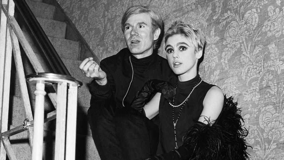 '60s "It Girl" Edie Sedgwick is pictured in conversation with the artist Andy Warhol. - John Springer Collection/Corbis/Getty Images