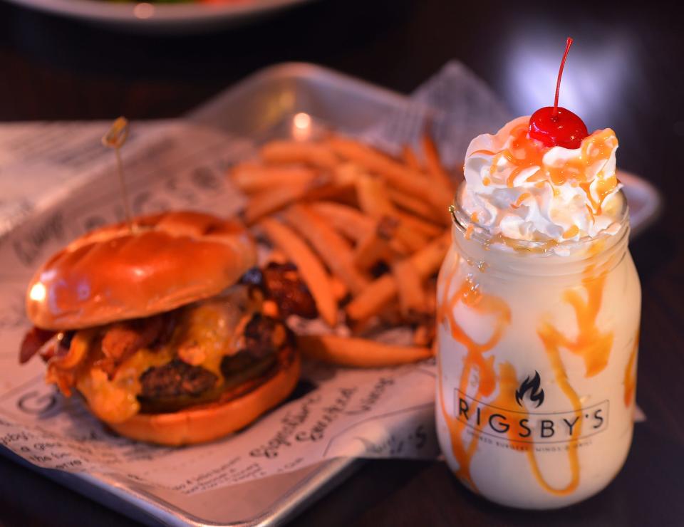 Rigsby's Smoked Burgers Wings & Grill at 176 N. Liberty Street in Spartanburg, Wednesday, December 8, 2021. The new restaurant has opened in the former Hub City Co-op building. The Dirty South Burger with Fries and Hand-spun Milkshake.