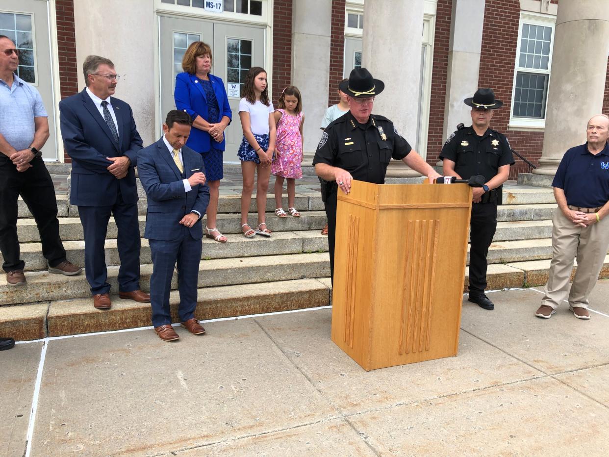 Oneida County Sheriff Rob Maciol speaks at a press conference at Whitesboro Middle School on Aug. 29, 2024 to announce how many local drivers were caught on camera illegally passing school buses during the last school year. Maciol and other local officials, including state Sen. Joseph Griffo, Assemblyman Brian Miller, District Attorney Todd Carville and Assemblywoman Marianne Buttenschon asked drivers to keep kids safe by obeying the law. Buttenschon brought along her neighbors Gabby, fifth grade, Lilly, third grade, and Abby, eighth grade, Friot who ride the bus to school.