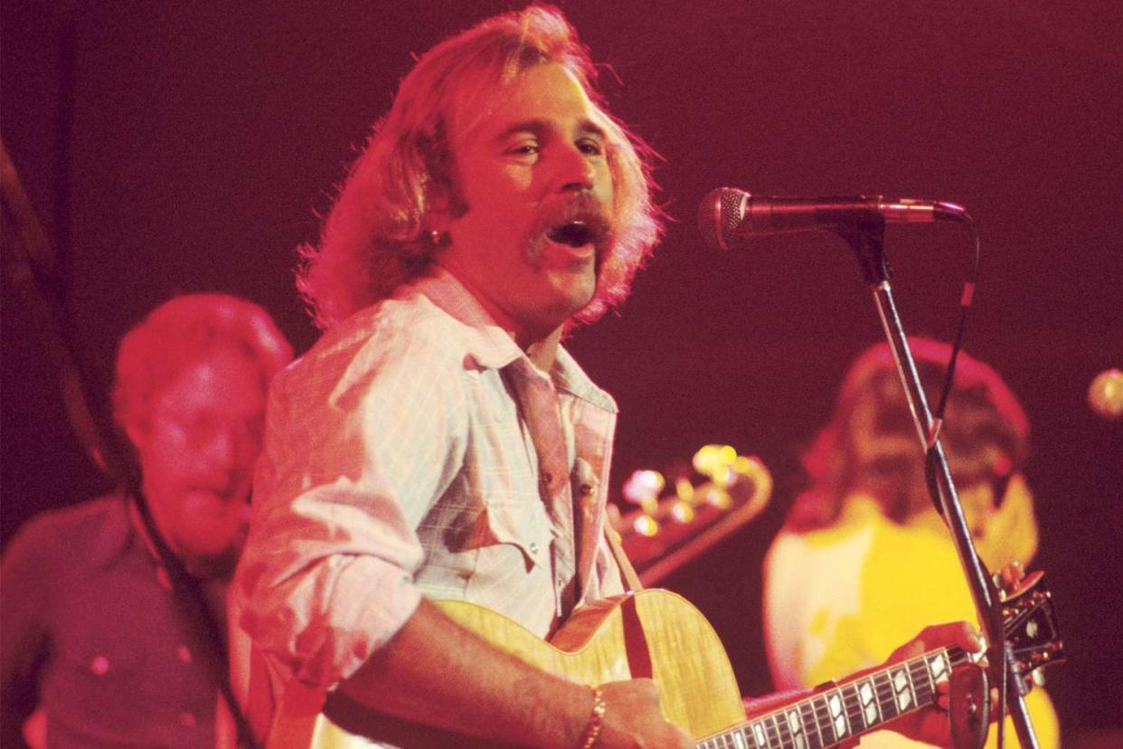 Singer-songwriter Jimmy Buffett performs with The Coral Reefer Band at The Omni Coliseum on September 4, 1976 in Atlanta, Georgia