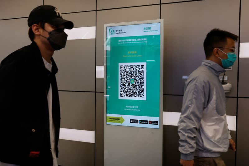 A QR code for the "LeaveHomeSafe" COVID-19 contact-tracing app is seen inside a shopping mall in Hong Kong