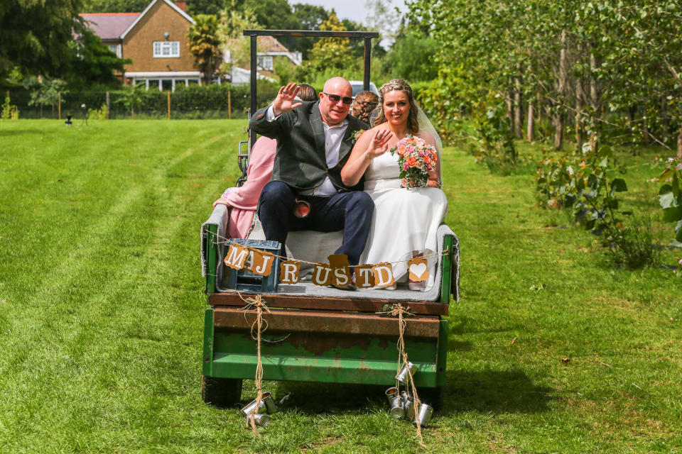 The couple arrived on a tractor. (SWNS)