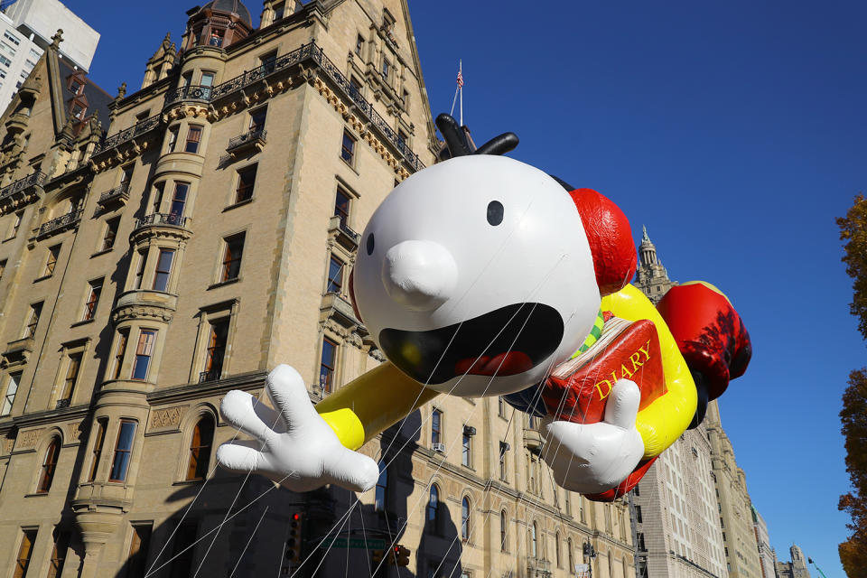 <p>The “Diary of a Wimpy Kid” Greg Heffley balloon is led down Central Park West in the 91st Macy’s Thanksgiving Day Parade in New York, Nov. 23, 2017. (Photo: Gordon Donovan/Yahoo News) </p>