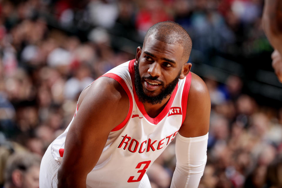 DALLAS, TX - MARCH 10: Chris Paul #3 of the Houston Rockets smiles against the Dallas Mavericks  on March 10, 2019 at the American Airlines Center in Dallas, Texas. NOTE TO USER: User expressly acknowledges and agrees that, by downloading and or using this photograph, User is consenting to the terms and conditions of the Getty Images License Agreement. Mandatory Copyright Notice: Copyright 2019 NBAE (Photo by Glenn James/NBAE via Getty Images)
