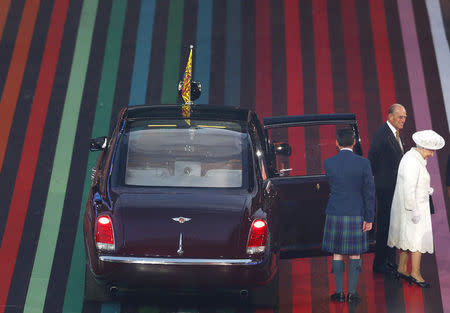 Britain's Queen Elizabeth and the Duke of Edinburgh arrive during the opening ceremony for the 2014 Commonwealth Games at Celtic Park in Glasgow, Scotland, July 23, 2014. REUTERS/Andrew Winning