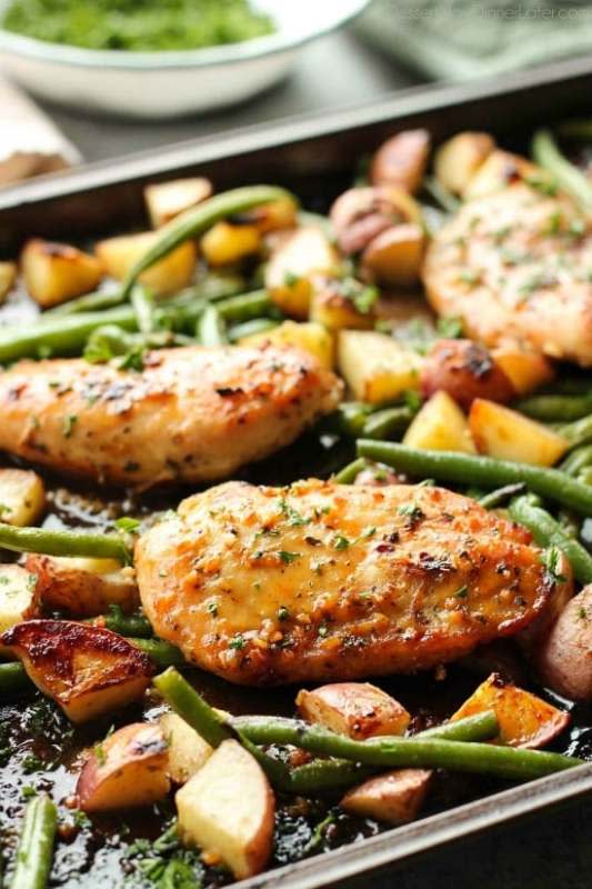 <p>Dessert Now Dinner Later</p><p>This one-pan chicken dinner has the most delicious honey garlic glazed chicken alongside tenderly roasted potatoes and green beans. Plus, it's so easy and flavorful, you'll make it again and again!</p><p><strong>Get the recipe: </strong><a href="https://www.dessertnowdinnerlater.com/one-pan-honey-garlic-chicken-vegetables/" rel="nofollow noopener" target="_blank" data-ylk="slk:One-Pan Honey Garlic Chicken and Vegetables;elm:context_link;itc:0;sec:content-canvas" class="link "><strong>One-Pan Honey Garlic Chicken and Vegetables</strong></a></p>