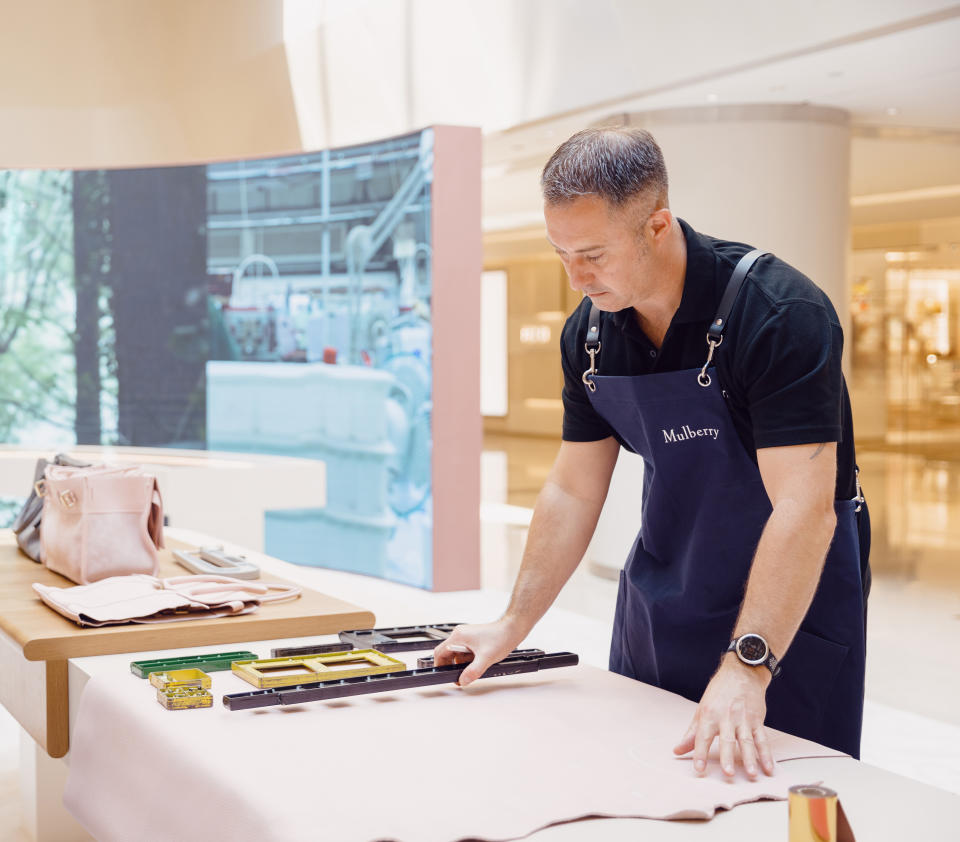 Mulberry artisans at the China World shopping mall pop-up in Beijing.