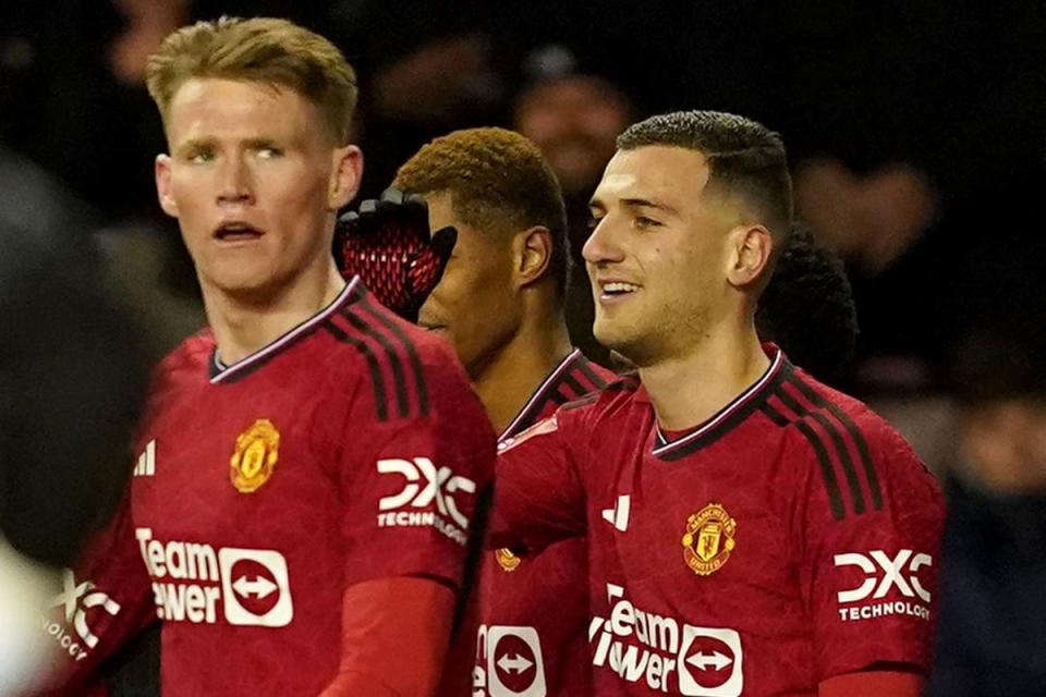 Diogo Dalot (right) celebrates scoring United’s opener (Martin Rickett/PA) (PA Wire)