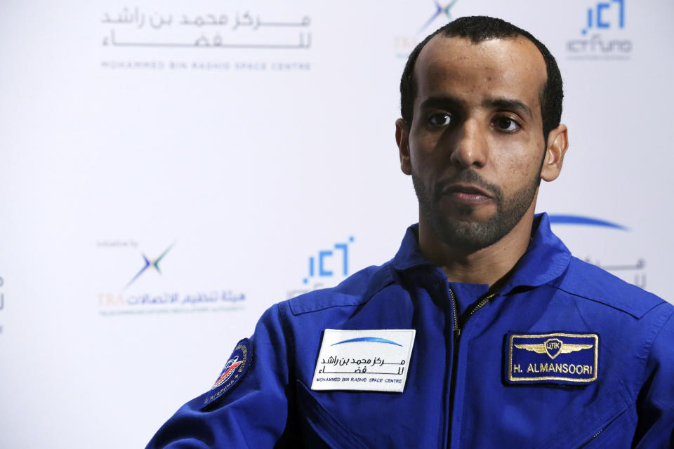 Emirati astronaut Hazza al-Mansoori is interviewed by The Associated Press in Dubai, United Arab Emirates, Monday, Feb. 25, 2019. The UAE said on Monday it will send either al-Mansoori or astronaut Sultan al-Neyadi to the International Space Station on Sept. 25 aboard a Russian Soyuz rocket. The UAE has a fledgling space program with big ambitions. (AP Photo/Jon Gambrell)