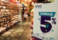 A sign of OVO payment is seen at a mall in Jakarta, Indonesia, November 8, 2018. Picture taken November 8, 2018. REUTERS/Beawiharta