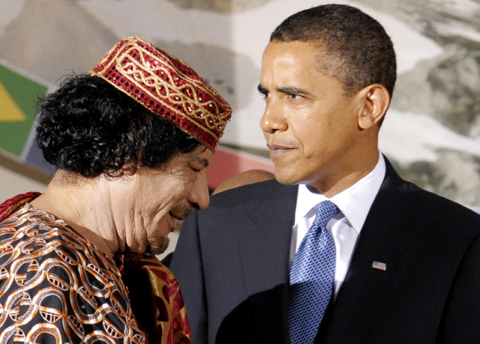 President Obama and Libyan leader Moammar Gadhafi at the G8/G5 summit in Italy, July 2009. (Photo: Michael Gottschalk/Pool/AP)