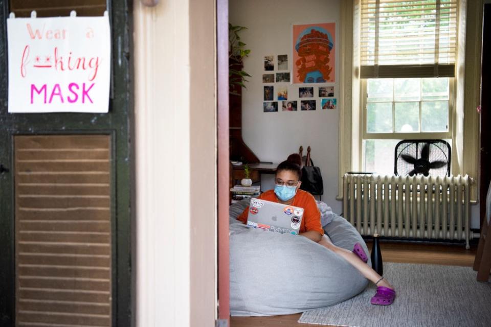 Sept. 8: University of Virginia senior Ashley Grullon works in her dorm room on as in-person classes continue at the University of Virginia. (Getty Images)