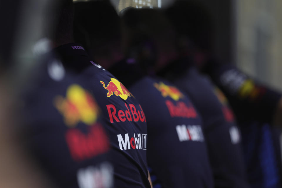 Red Bull team members watch monitors at pits during qualifying session ahead of the Formula One Saudi Arabian Grand Prix at the Jeddah Corniche Circuit, in Jedda, Saudi Arabia, Friday, March 8, 2024. Saudi Arabian Grand Prix will be held on Saturday, March 9, 2024. (AP Photo/Giuseppe Cacace/Pool)