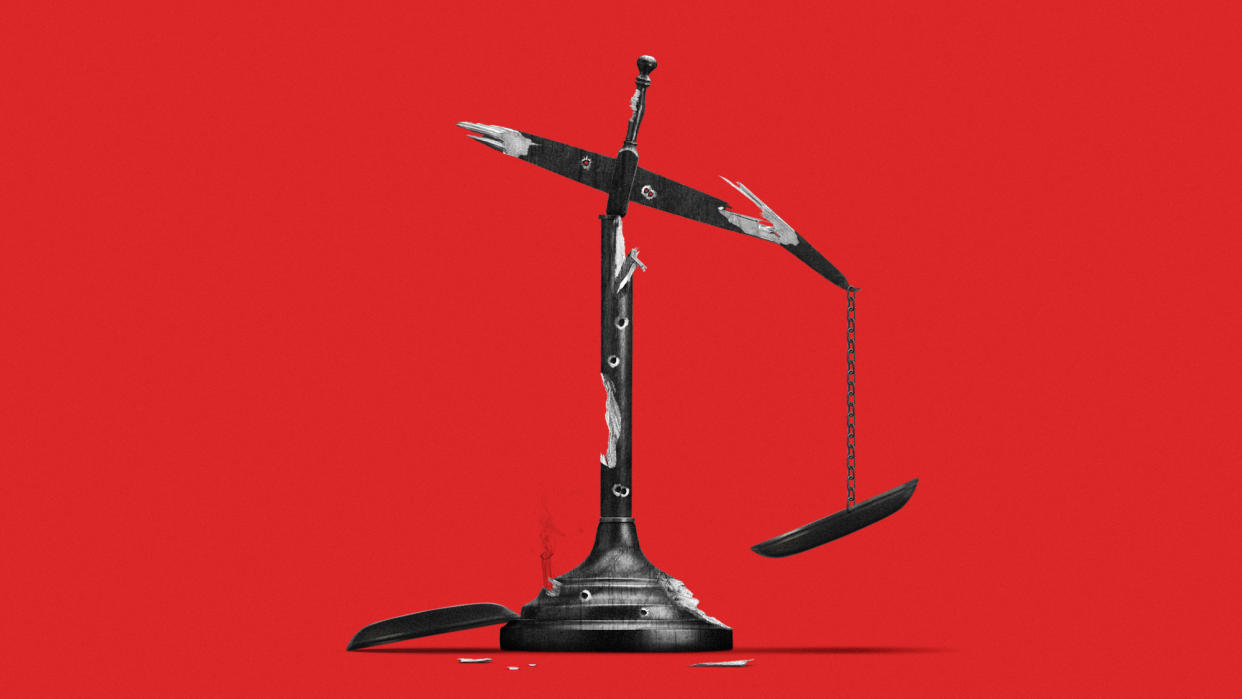  Illustration of the scales of justice splintered and riddled with bullet holes. 