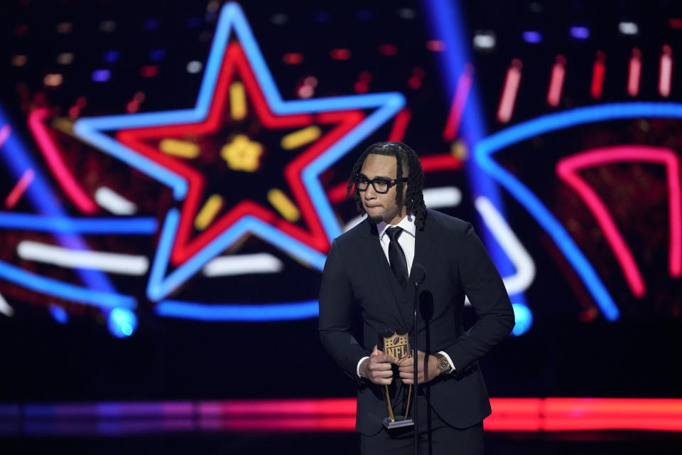 Houston Texans' C.J. Stroud, AP offensive rookie of the year speaks during the NFL Honors award show ahead of the Super Bowl 58 football game Thursday, Feb. 8, 2024, in Las Vegas. The San Francisco 49ers face the Kansas City Chiefs in Super Bowl 58 on Sunday. (AP Photo/David J. Phillip)