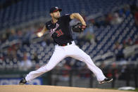 Washington Nationals starting pitcher Max Scherzer winds up during the first inning of the team's baseball game against the San Francisco Giants, Friday, June 11, 2021, in Washington. (AP Photo/Nick Wass)