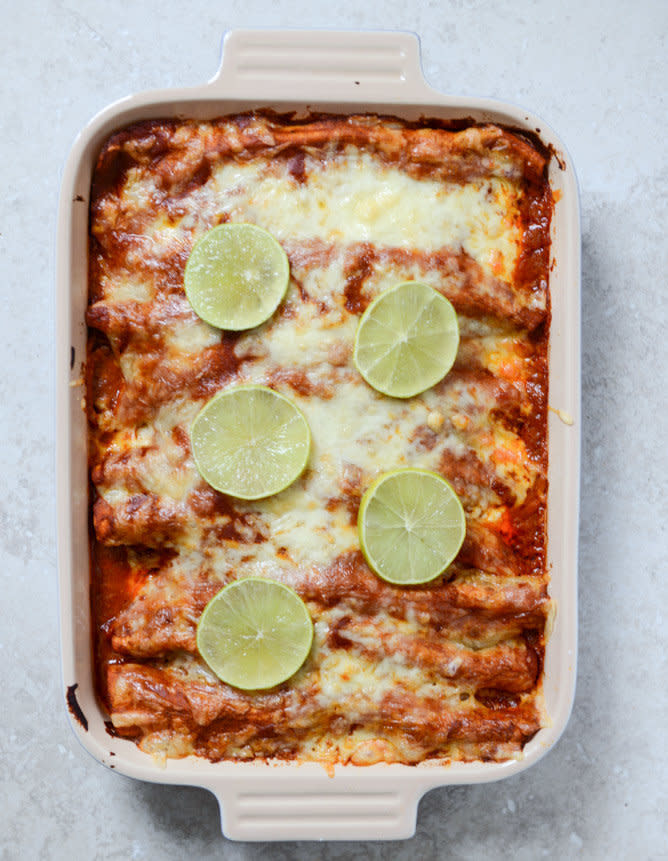 <strong>Get the <a href="http://www.howsweeteats.com/2013/12/spicy-beer-braised-lime-chicken-enchiladas/">Spicy Beer Braised Chicken Enchiladas recipe</a>&nbsp;from How Sweet It Is</strong>