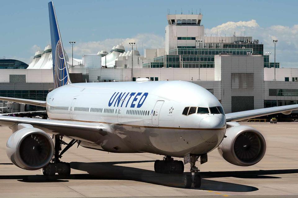 <p>Robert Alexander/Getty Images</p> United Airlines Boeing 777 passenger aircraft photographed in Colorado in June 2019