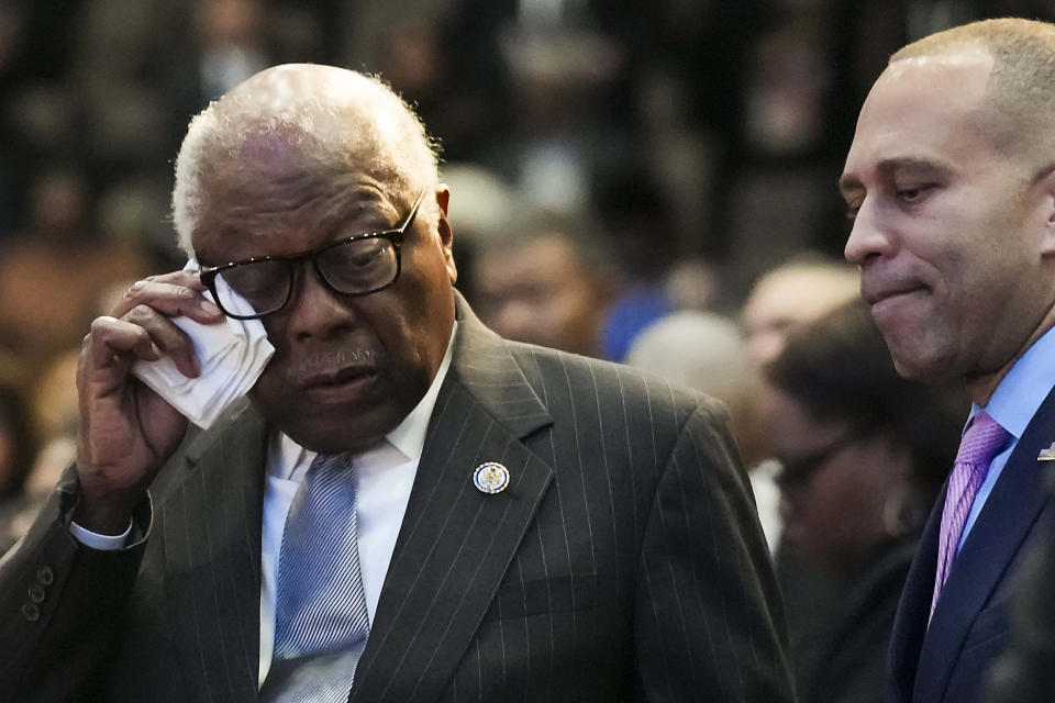 Rep. James Clyburn, D-SC, wipes a tear as he stands with House Minority Leader Hakeem Jeffries, D-NY, during funeral services for former U.S. Rep. Eddie Bernice Johnson at Concord Church on Tuesday, Jan. 9, 2024, in Dallas. (Smiley N. Pool/The Dallas Morning News via AP, Pool)