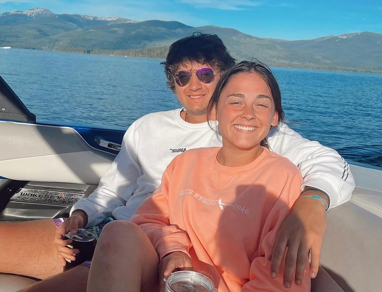 This July 2022 photo provided by Jazzmin Kernodle shows University of Idaho students Xana Kernodle, right, and Ethan Chapin on a boat on Priest Lake, in Idaho. Both students were among four found stabbed to death in an off-campus rental home on Nov. 13. (Jazzmin Kernodle via AP)